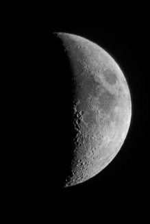 A photo of the moon taken from an apartment balcony on 18 December 2012, Hamilton, Ontario, using hand-held eyepiece projection.