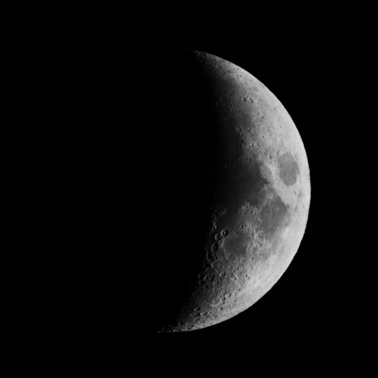 The moon, photographed on 17 March 2013 from an apartment balcony in Hamilton, Ontario, with an 80 mm f/15 refracting telescope and Nikon D800 camera.