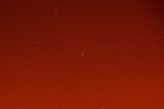 A faint image of Comet C/2011 L4 (PanSTARRS) photographed with a Nikon D7000 and zoom lens at 92 mm, on the evening of 3 April 2013.