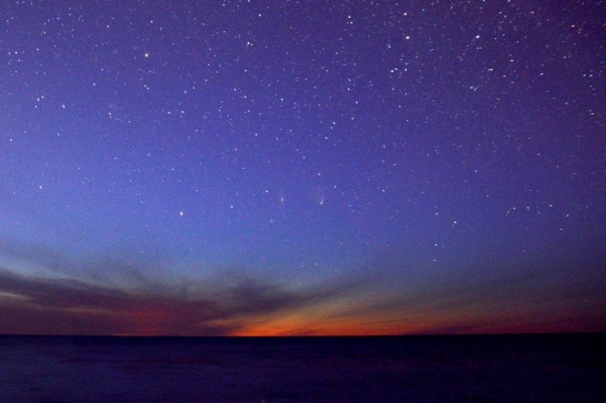 The Andromeda Galaxy (M31) and Comet C/2011 L4 (PanSTARRS) both appear as faint smudges in the centre of this 30 second exposure, over Lake Huron. Friday 5 April 2013 at Lurgan Beach.